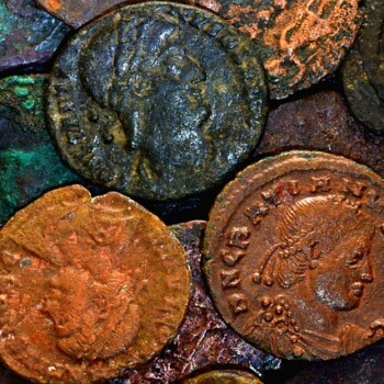 ancient copper coins, many tarnished